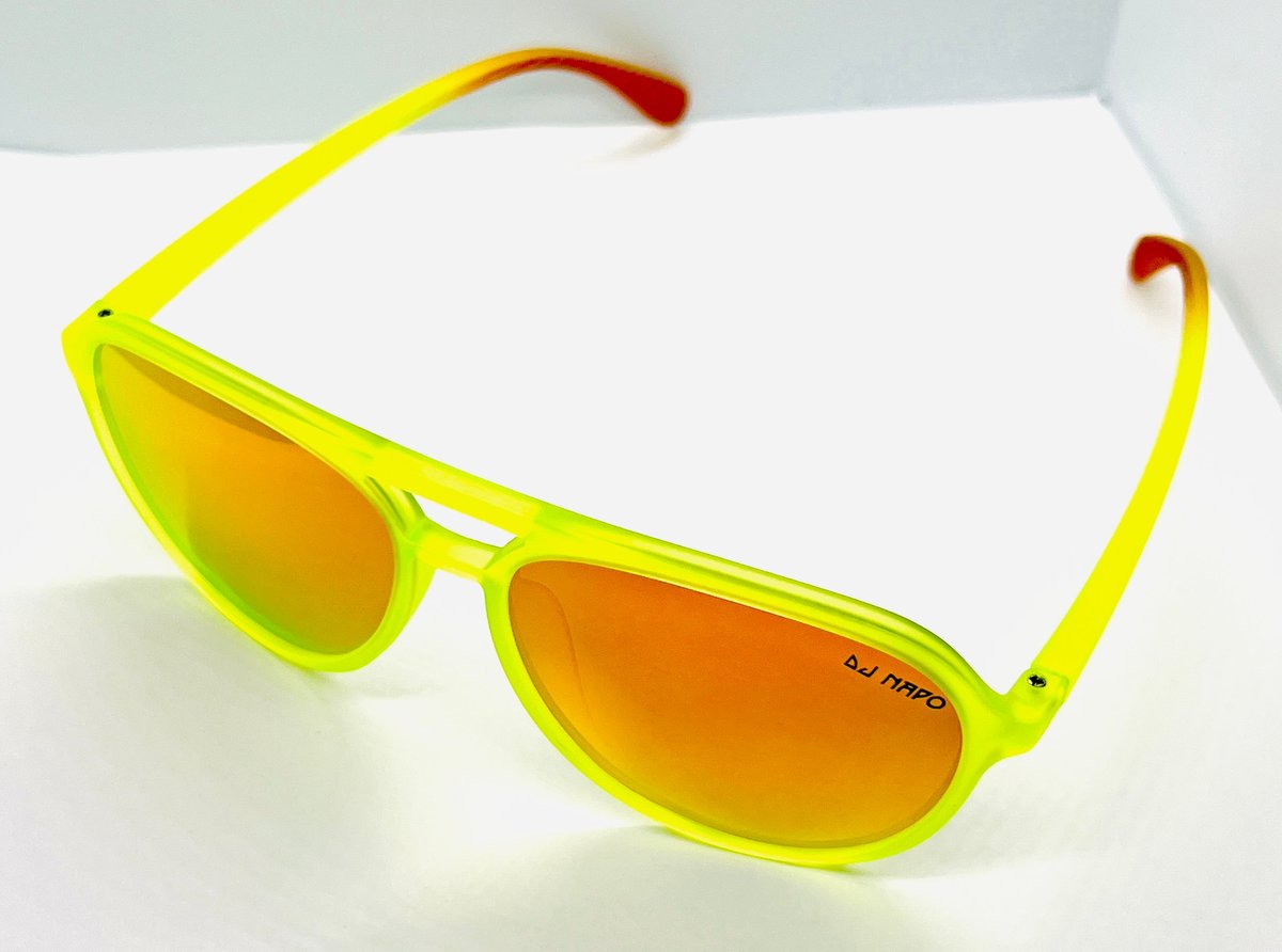 Bright yellow aviator sunglasses with orange-tinted lenses and red temple tips on a white background