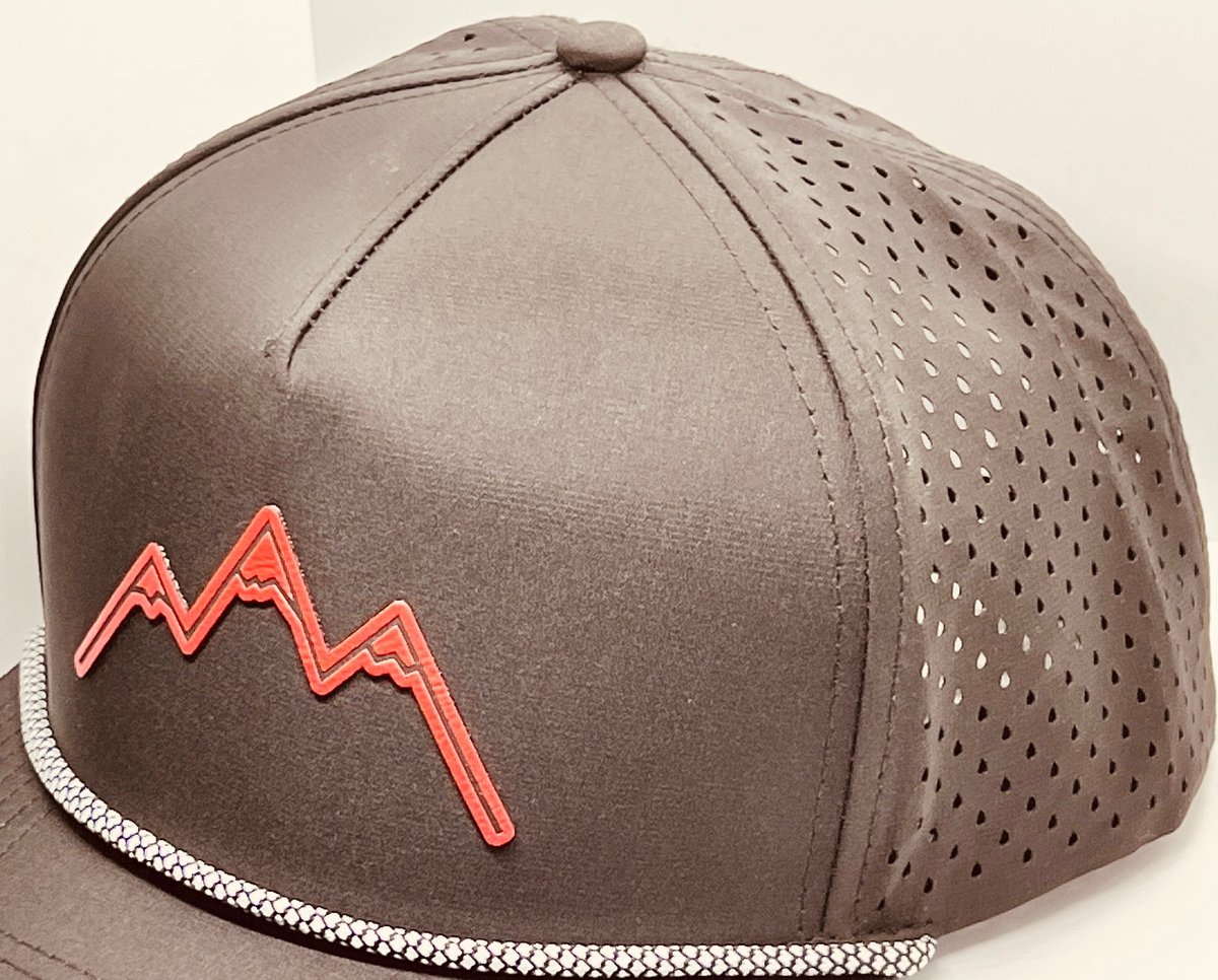 Taupe baseball cap with red mountain range design and perforated mesh back panel