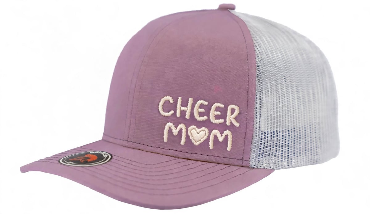 Mauve and white trucker cap with CHEER MOM text and heart symbol embroidered on front