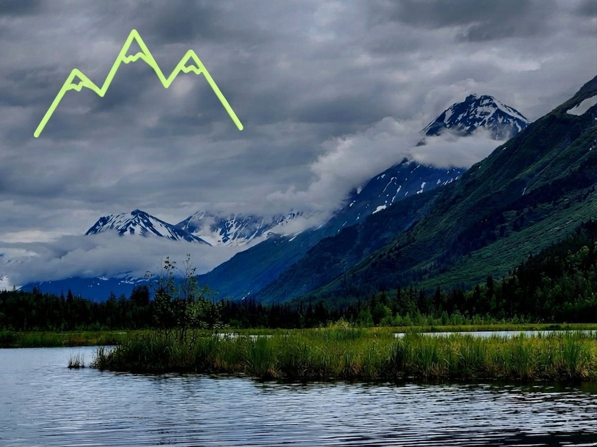 Snow-capped mountains with neon green mountain outline overlay above a lake with marshy shoreline and forested landscape