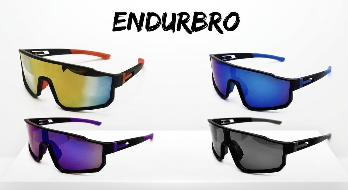 Four ENDURBRO sports sunglasses in different lens colors: yellow, blue, purple, and gray with black frames by TLA Promotions